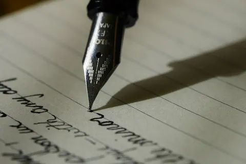 A notebook and writing supplies