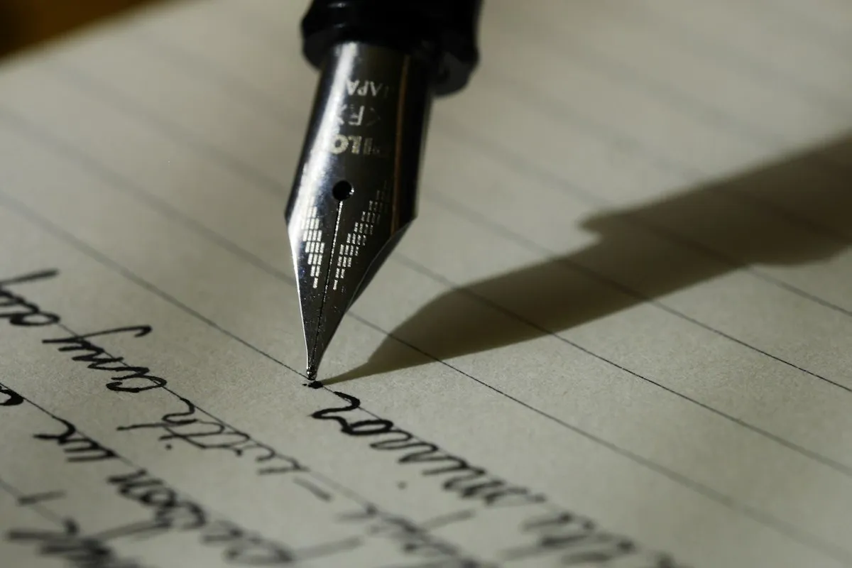 A notebook and writing supplies