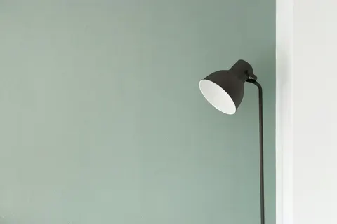 A lamp in a quiet home corner